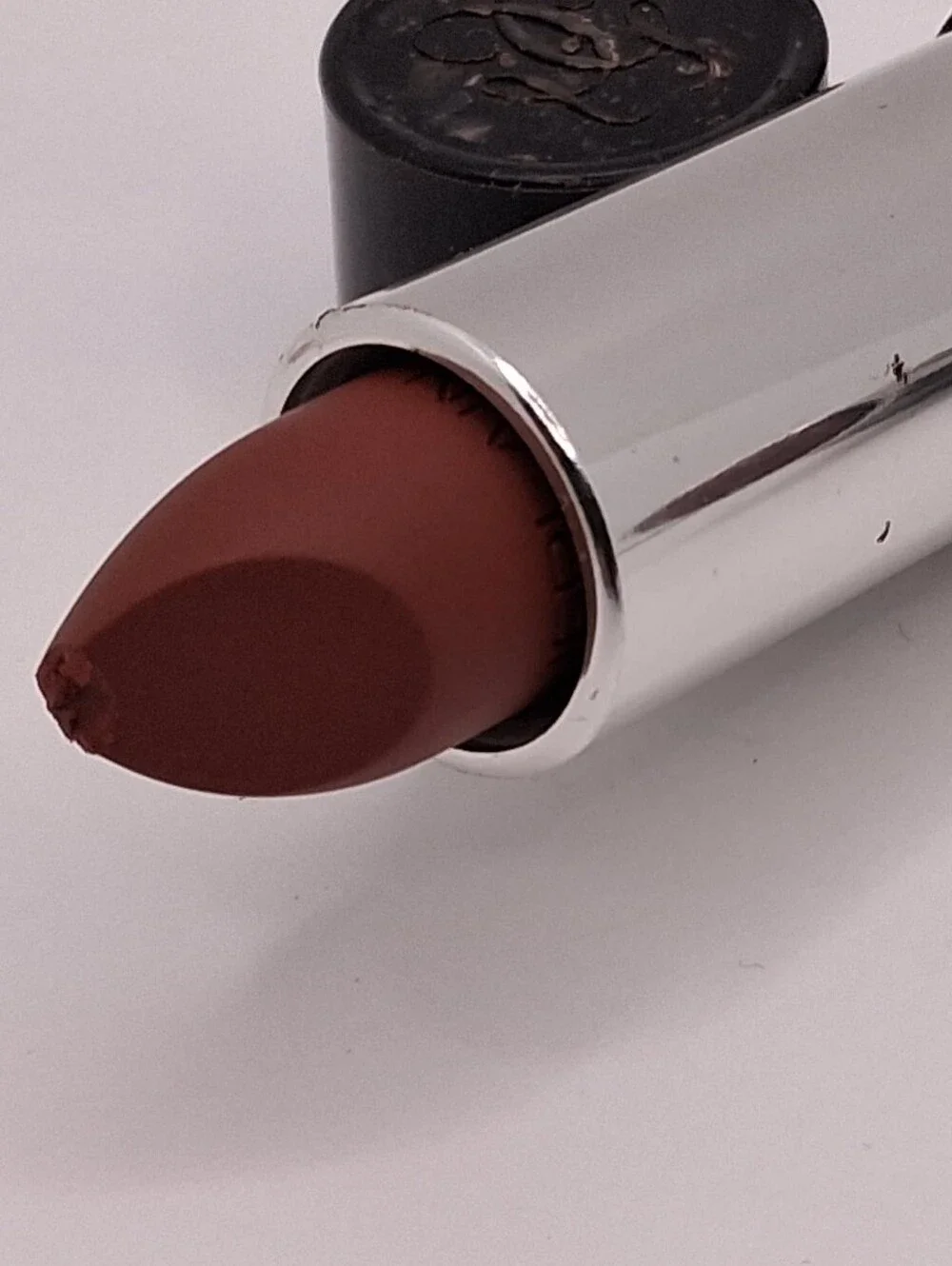 Guerlain #04 is a very warm-toned, light-medium copper semi-matte finish/new No